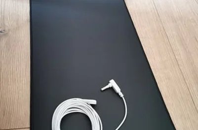 Terra Grounding Mat cord detail on wooden floor